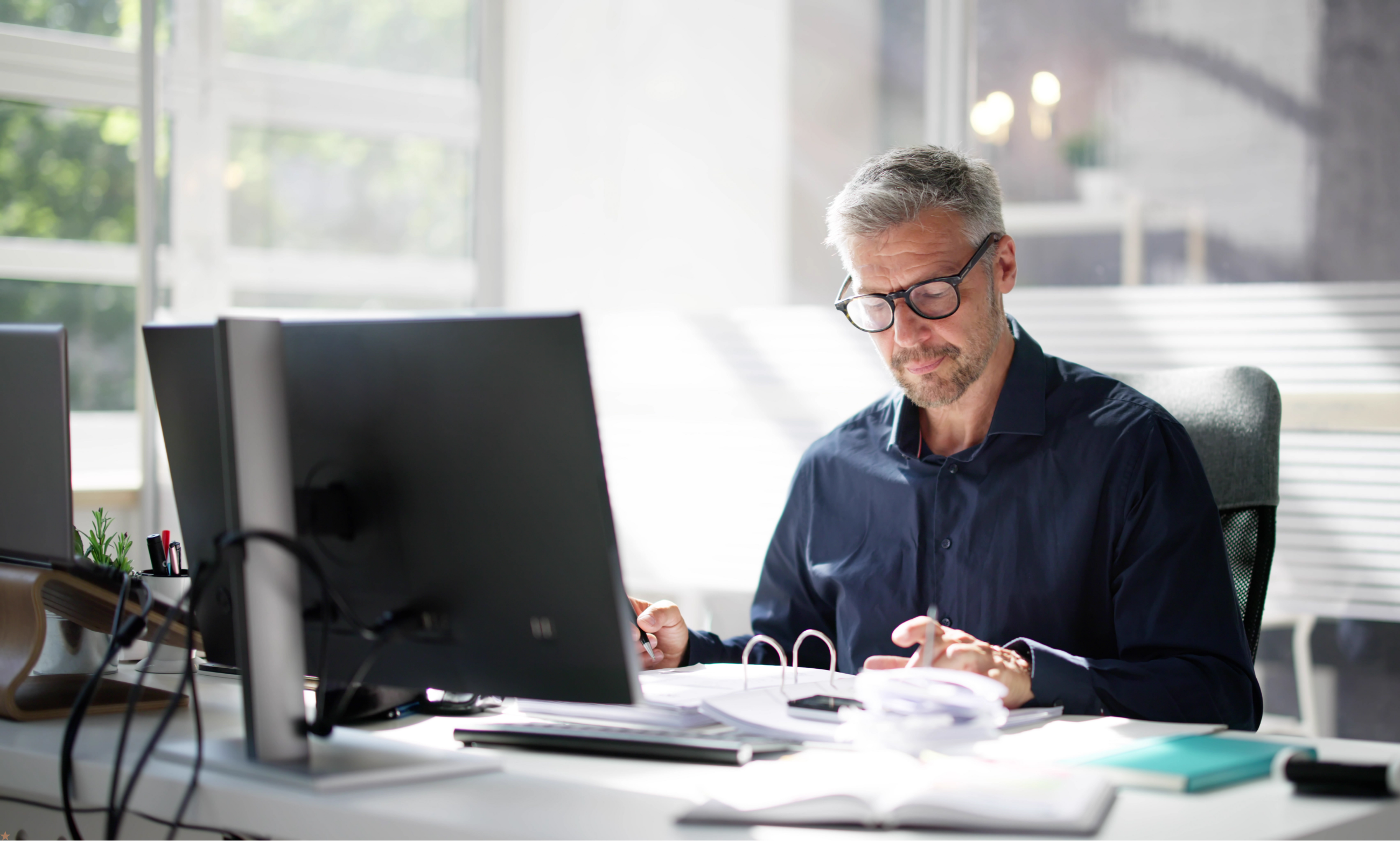 Business team using secure remote desktop services across connected devices